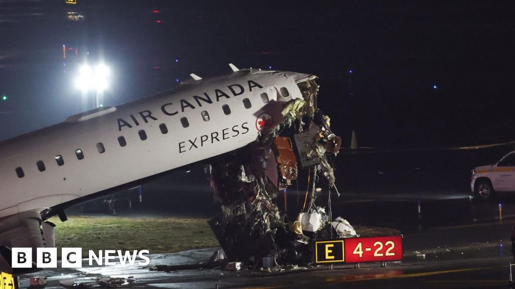 Plane and ground vehicle collide at New York’s LaGuardia airport halting flights