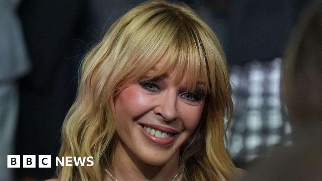 Kylie Minogue says cancer experience ‘still with me’