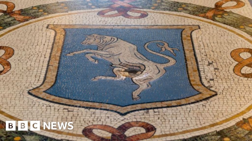 Milan gives bull mosaic testicles worn down by spinning tourists some TLC