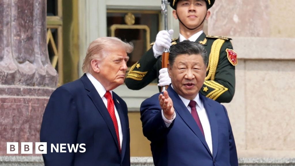 In pictures: Trump hosted by Xi Jinping in high-stakes China summit
