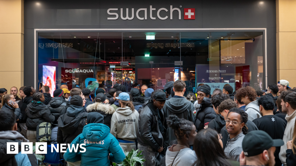 AP Swatch shuts UK stores after crowds queue for new watch