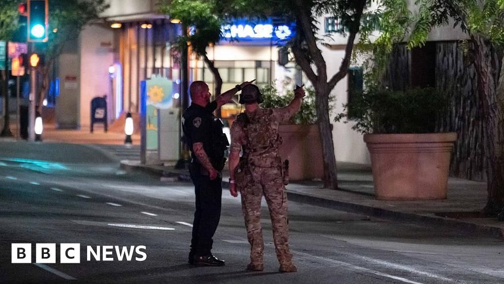 Man shot dead after taking multiple hostages in California bank