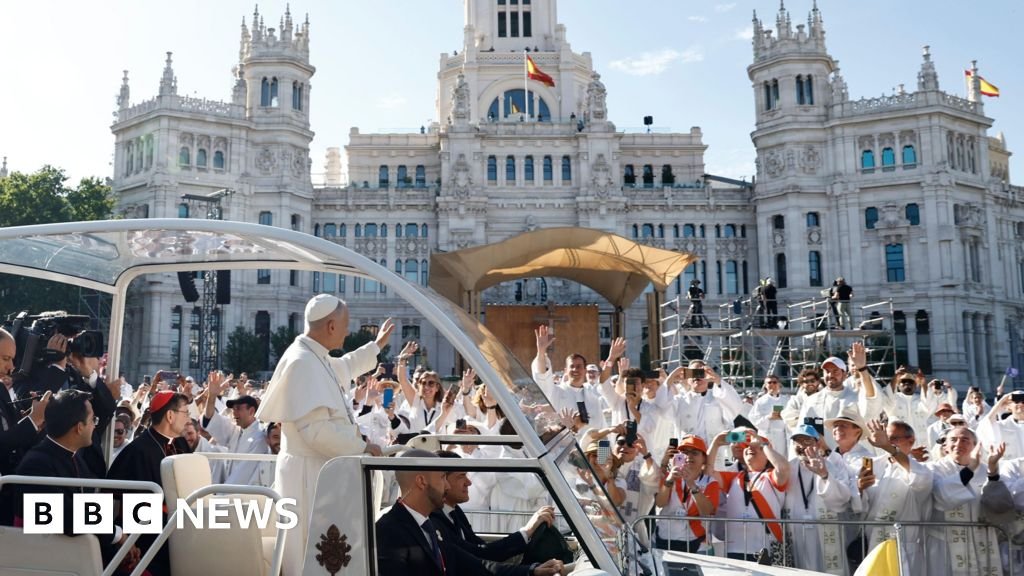 Huge crowds throng Madrid streets as Pope holds open-air Mass