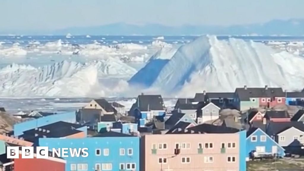 Giant iceberg turns over near Greenland’s coast